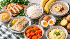 Easily digested foods including white rice, bananas, eggs, chicken, fish, cooked carrots, potatoes and oatmeal